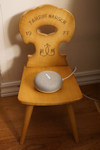 Google Home device on chair 