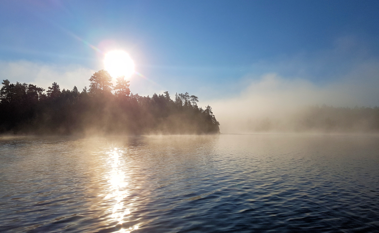 Fog over Lake Temagami dissipating 