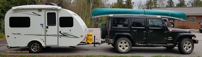Jeep and Trailer with lift